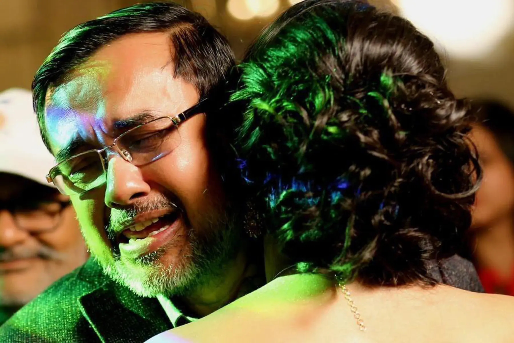 Witness the heartfelt moment between a father and daughter as they share a tearful embrace on her wedding day. Studio Kings Photography captures the emotions that make Indian weddings truly special.