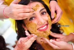 Experience the golden Haldi celebrations as the bride embarks on her glowing journey. Studio Kings Photography showcases the beauty and cultural significance of this ritual.