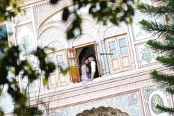 Embrace the elegance of their love in these radiant pre-wedding portraits. Studio Kings Wedding Photography highlights the sophistication and unity that radiate.