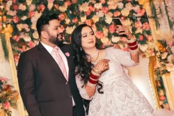 Share in the joyful moment of the couple as they capture a selfie of their love. Studio Kings Wedding Photography celebrates the genuine smiles and togetherness in this special shot.