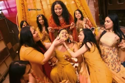 Experience the blend of tradition and fun during the groom's Haldi ceremony. Studio Kings Photography showcases the camaraderie and cultural significance of this event.