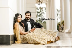 Experience an affectionate embrace in this couple's portrait filled with warmth. Studio Kings Wedding Photography captures the tenderness and deep connection between them.